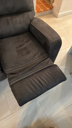 Three-seater sofa with two recliners