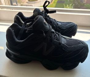 New Balance All-Black Low-Top Sneakers
