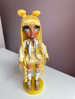 Rainbow High Sunny doll with accessories.