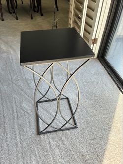Beautiful Black Metal Table with Arched Silver/Chrome Sides