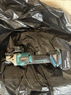 makita grinder with 5amp battery $100 obo