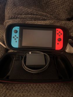 Nintendo switch console v2 with charger and case