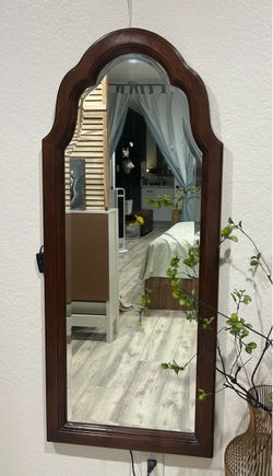 Vintage dark wood scalloped wall mirror