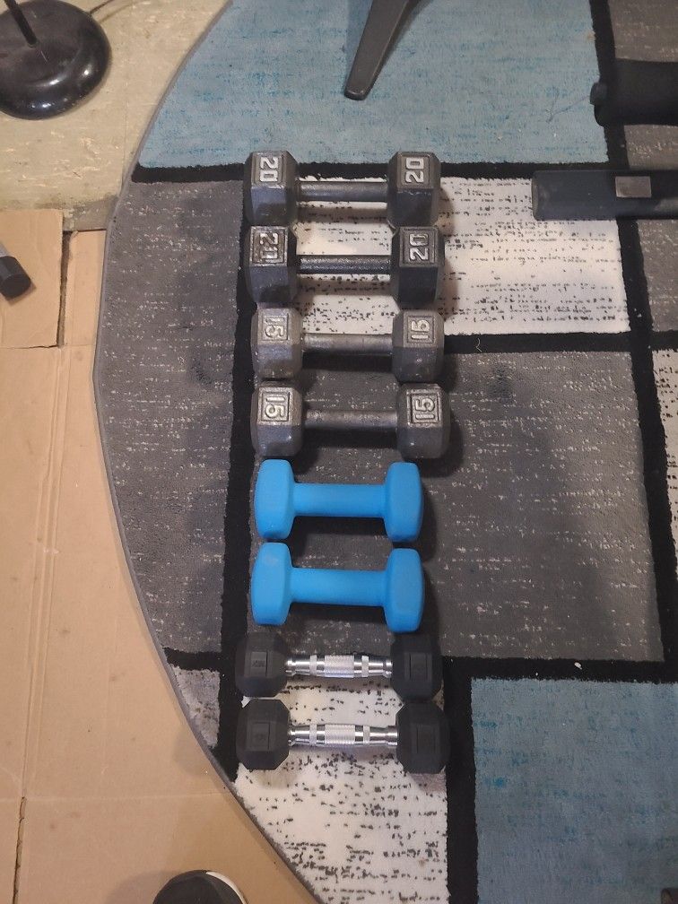 Dumbbells 4 Sets Together  20lbs 15lbs  10lbs 5lbs
