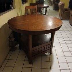 ROUND  WOOD 47"  TABLE  WITH 4 MATCHING CHAIRS
