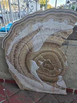 large slice of natural banded cave onyx.