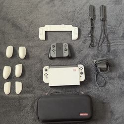 Nintendo Switch Oled + Carrying Case And Grip