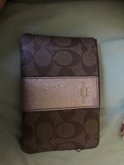 Light brown coach wrist wallet used good condition