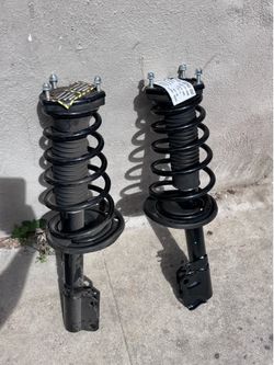 Toyota Camry rear strut / coil spring