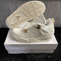 Air Jordan 4 Metallic Gold. 