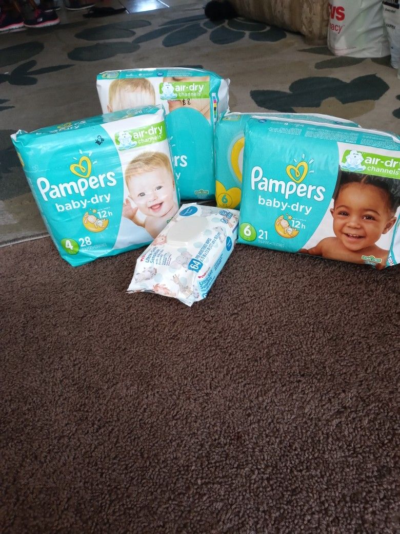 $35 Cuatro Bolsas De Pamper Y Una De Wipes