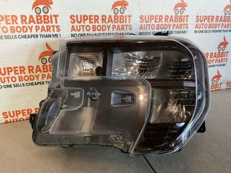 2026 Maverick Driver Headlight Base COMPLETE TABS original ā