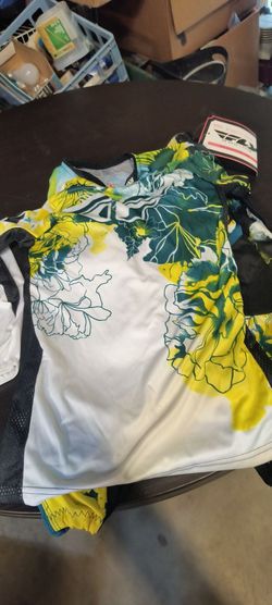 Youths riding motocross gear