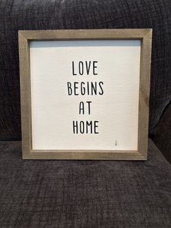 “Love begins at Home” sign