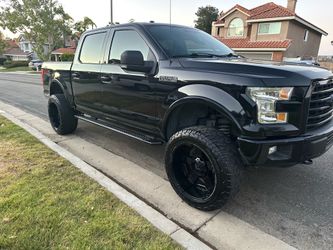 22” XD Rockstar Wheels & Yokohama Geolandar X-AT 35x12.50R22 Tires