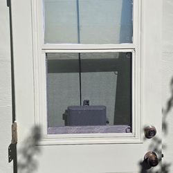 Solid exterior door, 6 foot 8“ x 30“ with century deadbolt and knob