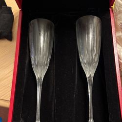 2 Cartier champagne flutes with flame cut crystal-$50.00