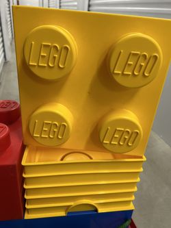 LEGO Storage Brick 4 (or 4-stud storage brick) in yellow.