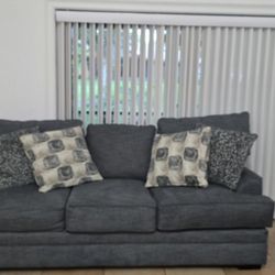 Biue sofa Have two white chairs