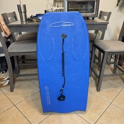 The original Morey Boogie Board Mach 9: XF in great condition w/ leash