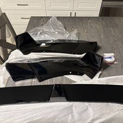 AMP-Z 3-piece Front Bumper Lip kit (part numbers BTQP ZST-637A and BTQP ZST-637B).