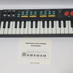 Vintage 32-Key Portable Electronic Keyboard Hing Hon EK-001  + Manual