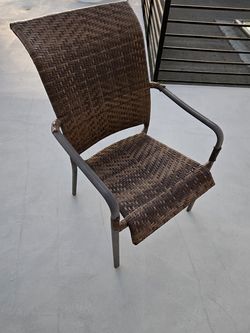Set of four outdoor wicker stackable chairs