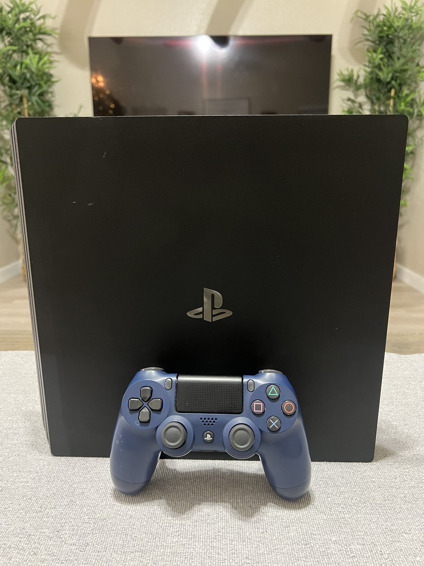 PlayStation 4 Pro Black 1TB Console with Navy Blue Sony PS4 Controller