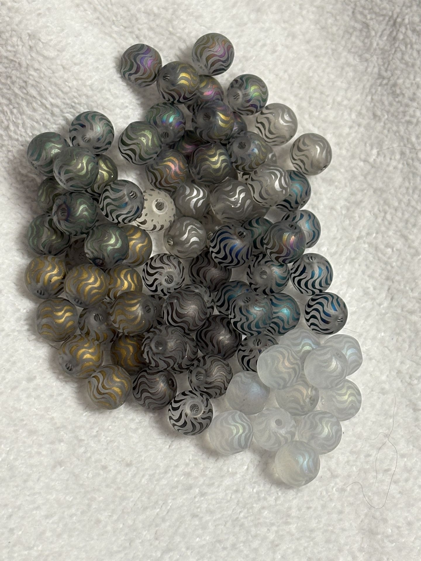 77 PIECES OF “Swirl Bead SOUP” Glass.  8mm