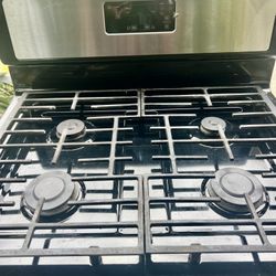 Whirlpool Stainless Steel/Black Stove Includes the hose.