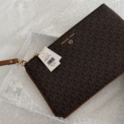 Michael Kors Jet Set Charm Large Top-Zip Wristlet in the classic Brown/Acorn Signature Logo print (Style #34S2GT9W3B).