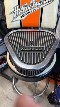 Triangular Edelbrock air cleaner