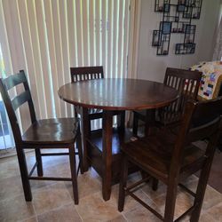 Bar height drop leaf table and 4 stools