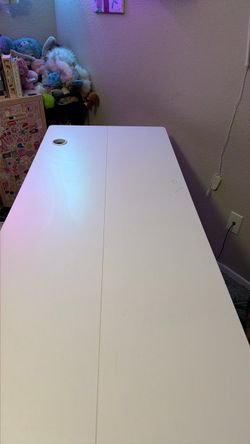 Adjustable electric desk