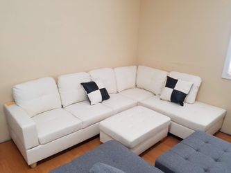 Brand new in box white faux leather sectional set special