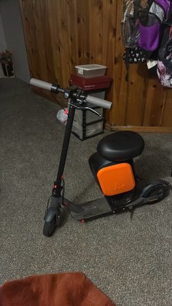 Electric Scooter with Seat Attachment