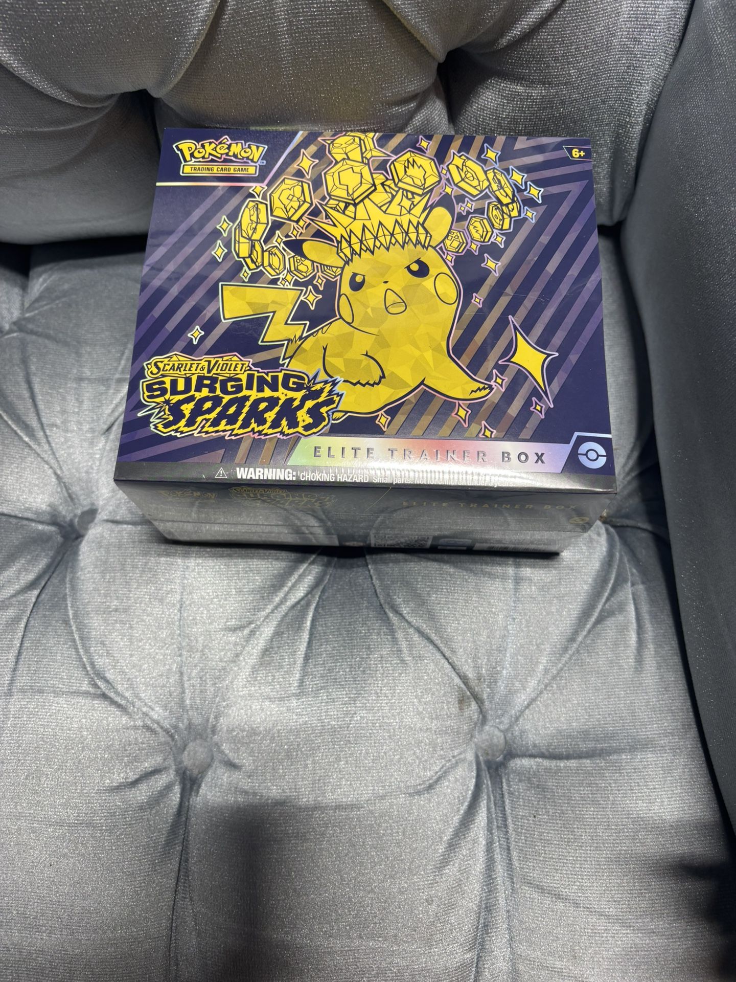 Pokémon Surging Sparks Elite Trainer Box (ETB) – Sealed