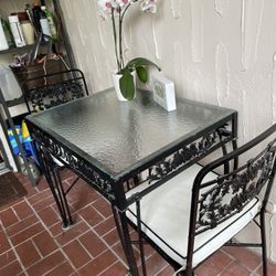 Black Aluminum And Wrought Iron Glass top Table With Matching Chairs