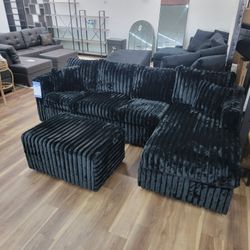 Brand New Sectional And Ottoman In Black Corduroy 