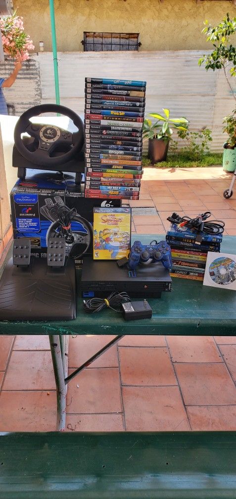 Playstation 2 Bundle With Steering Wheel