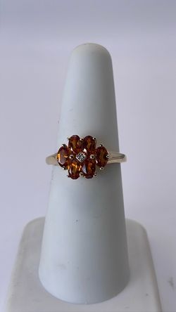 14k gold ring with orange CZ