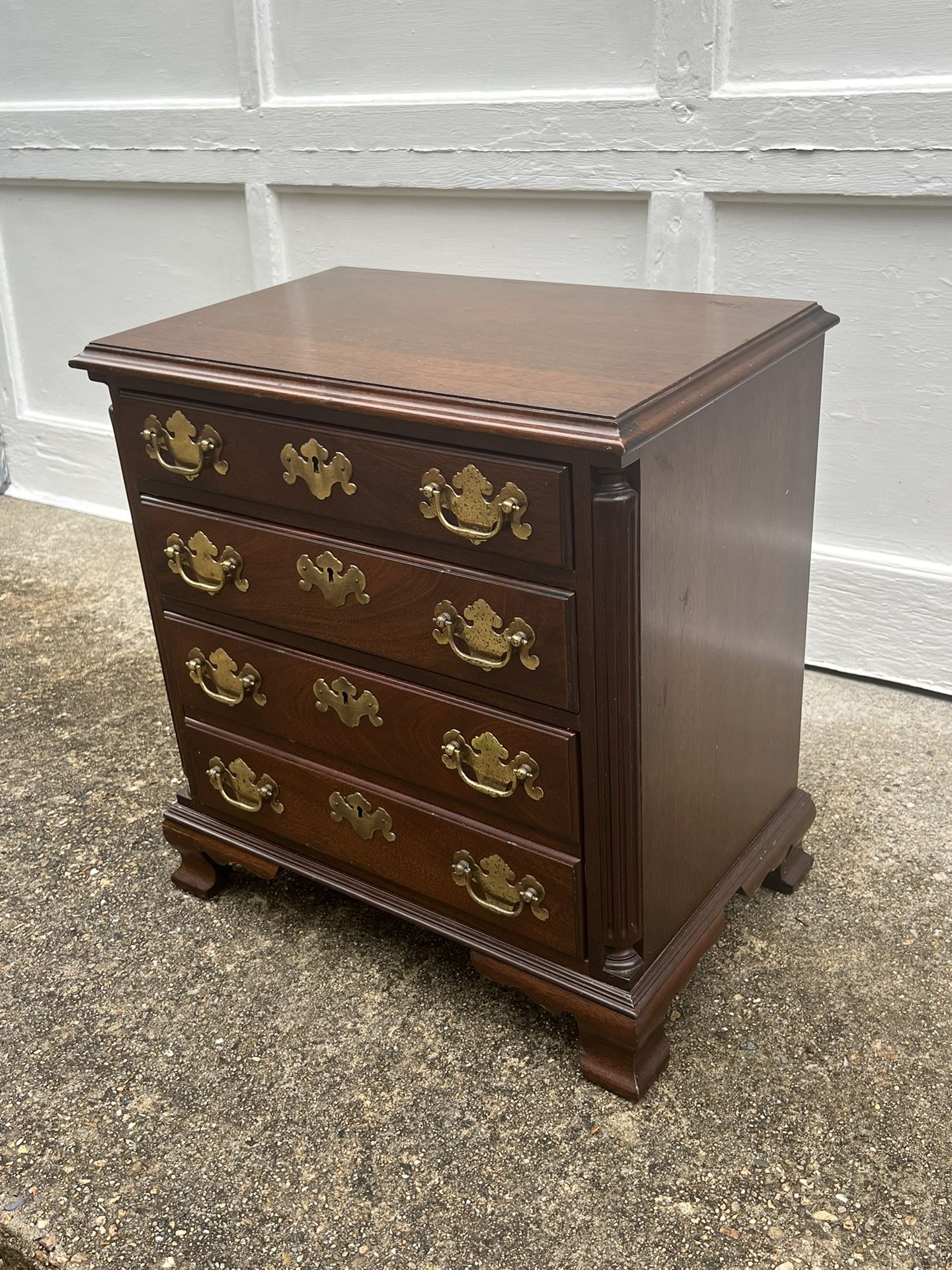 Mahogany three drawer nightstand 