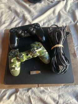 PS4 Slim with Controllers, Cables, and 256 GB Extended Storage