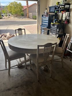 Beautiful heavy table and 5 chairs