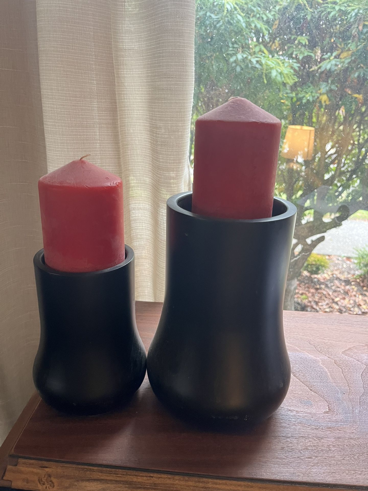 Two Candles And Candle Holders.