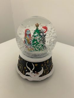 The Nightmare Before Christmas musical snow globe featuring Jack Skellington and Sally