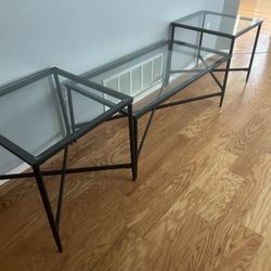 Set Of Three Black And Glass Tables, $100