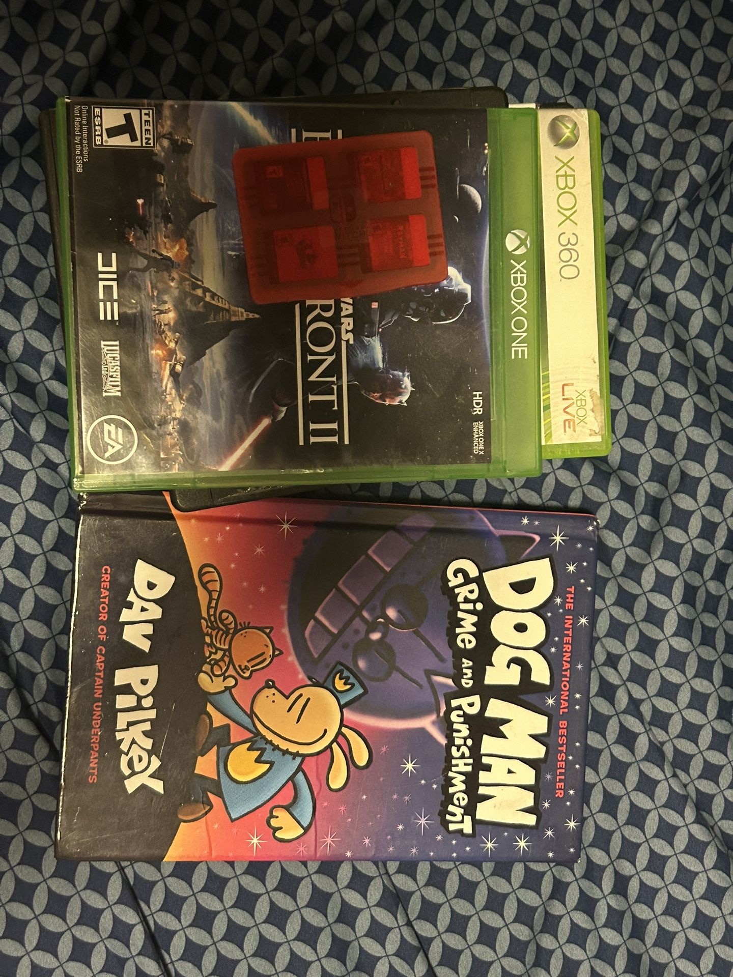 Multiple Things: Xbox Games, Nintendo Switch games, And Book.