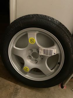 A bmw 330i spare tire