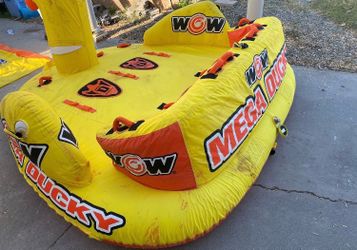 Mega ducky to this party behind your boat on the lake in the ocean super cool dock kids can jump up and on it to them around